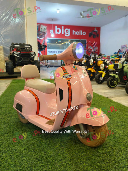Kids Electric Vespa Scooter for Girls displayed at eToys.pk showroom